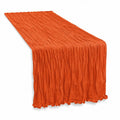 Runner da tavola 180 x 40 cm in tessuto arancione stropicciato con bordi ondulati decorativo